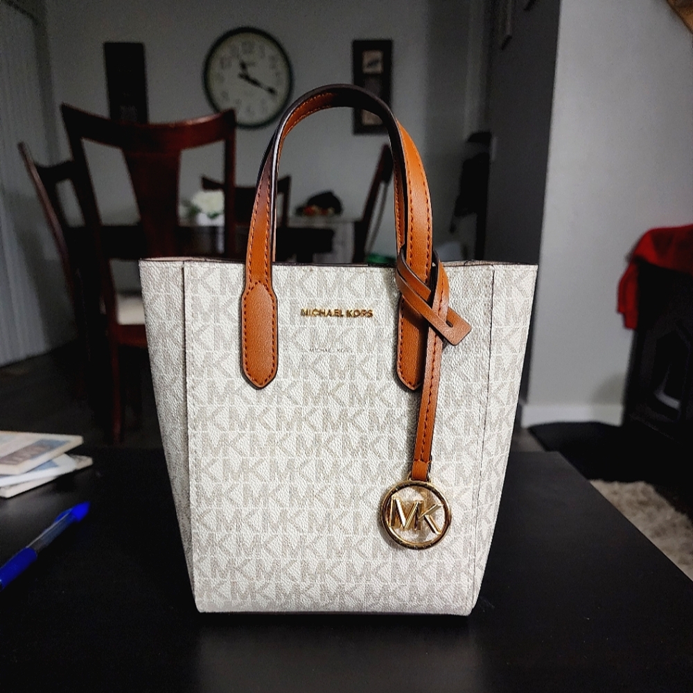 Michael Kors is a small clutch